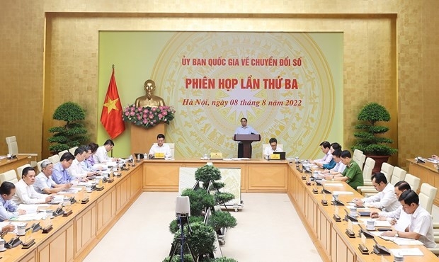 ກອງປະຊຸມຄັ້ງທີ 3 ຂອງຄະນະກຳມະການເພື່ອຕີລາຄາໝາກຜົນແຫ່ງການຫັນເປັນດີຈີຕອນໃນ 6 ເດືອນຕົ້ນປີ 2022 (ພາບ: Dương Giang/TTXVN)
